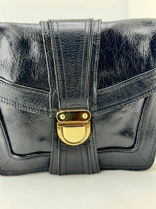 Sauvage black leather convertible clutch